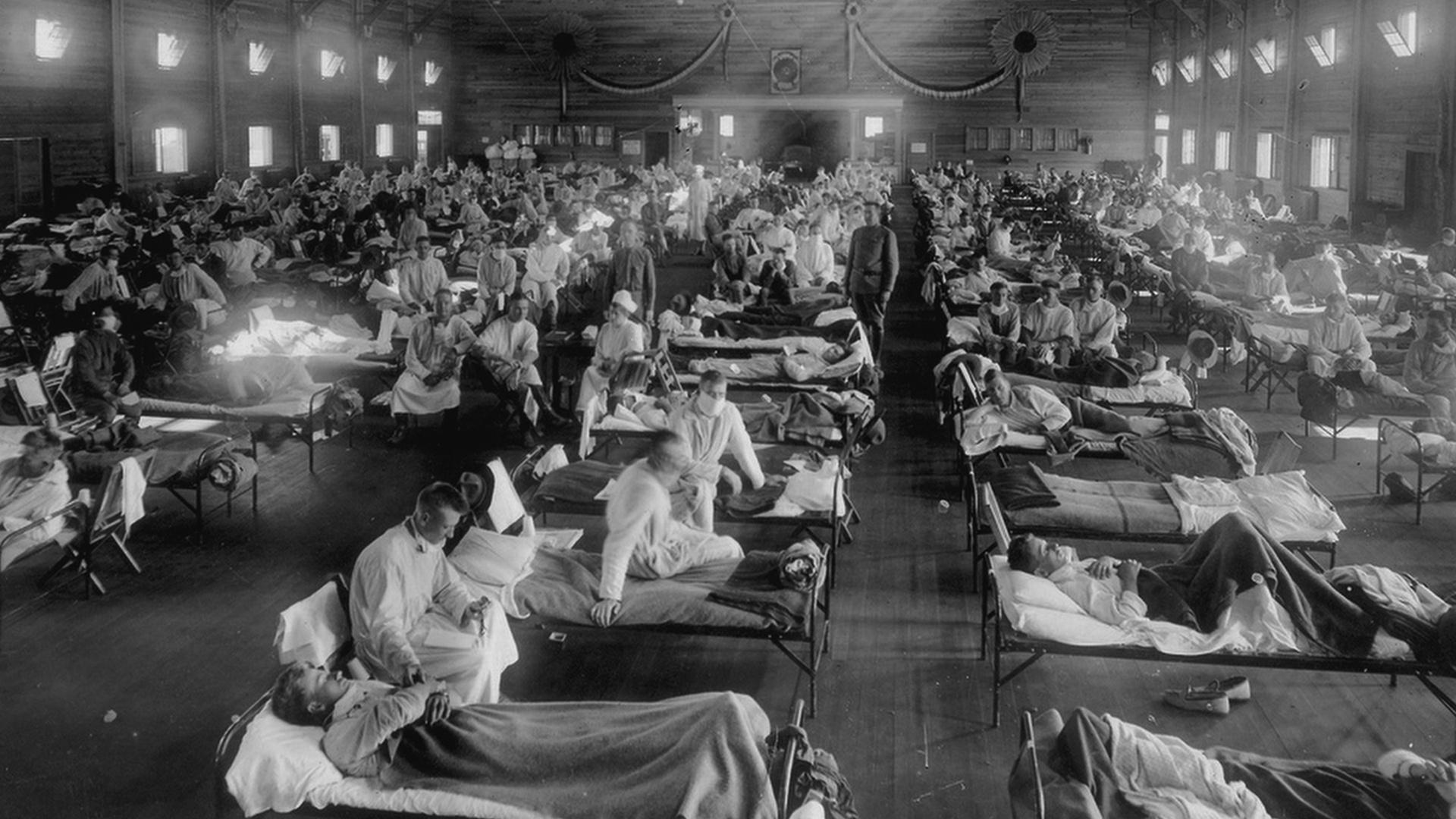 Black and white image of patients at an emergency hospital at Camp Funston.